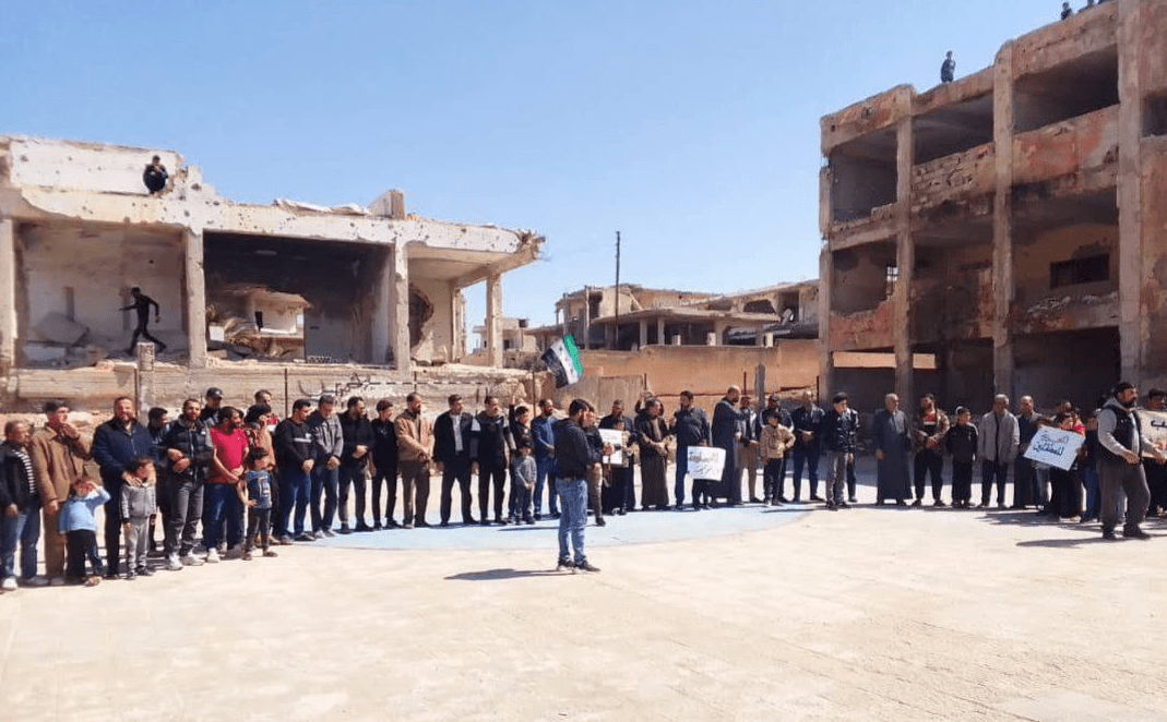 Demonstrators in Daraa al-Balad, southern Syria, commemorate the twelfth anniversary of the Syrian revolution, 17/3/2023 (Web)