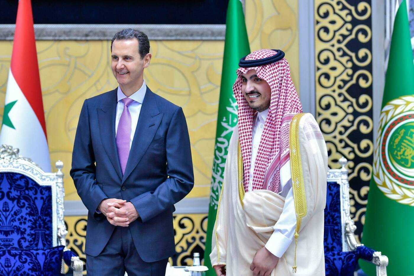 Assad grins at the Arab League summit, and Syrians in exile recoil