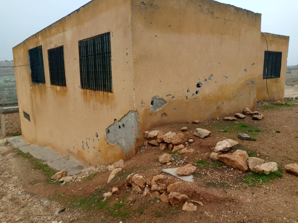 Holes in the walls of the Bashmara village school in the Sherawa subdistrict of Afrin, left by bullets and shrapnel from shells fired from areas held by Ankara-backed opposition factions, 10/12/2023 (Syria Direct)