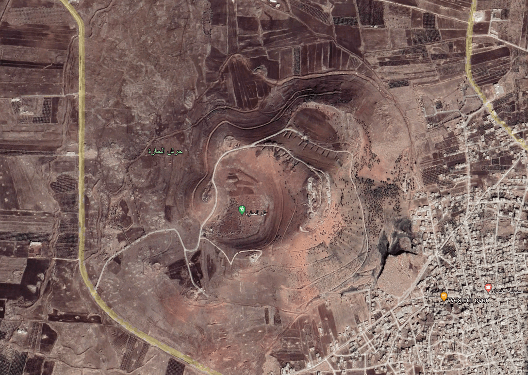 Satellite images show the Tal al-Hara woods, in northwestern Daraa province, were all but stripped bare between October 2011 and November 2022. (Google Earth)