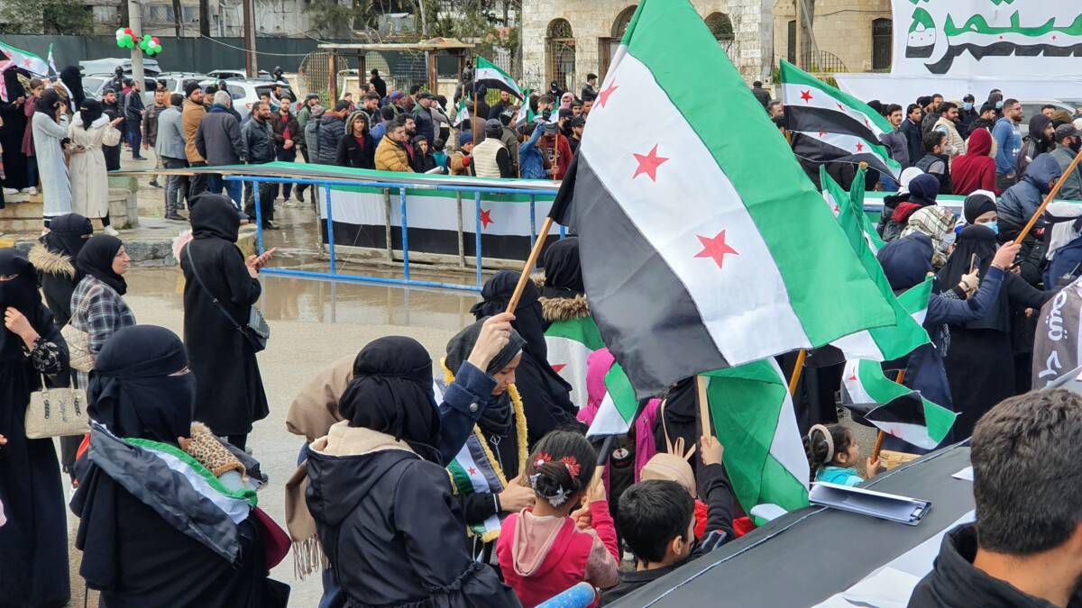 Women in opposition-held Idlib city, in northwestern Syria participate in a demonstration marking the 13th anniversary of the Syrian revolution, 15/3/2024 (Afaf Jakmour/Syria Direct)