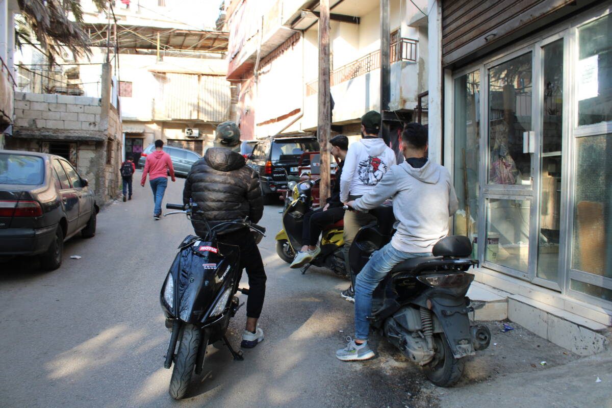 Rabia Othman’s friends pose with their motorcycles in Burj al-Barajneh, Beirut, 27/2/2024 (Hanna Davis/Syria Direct)