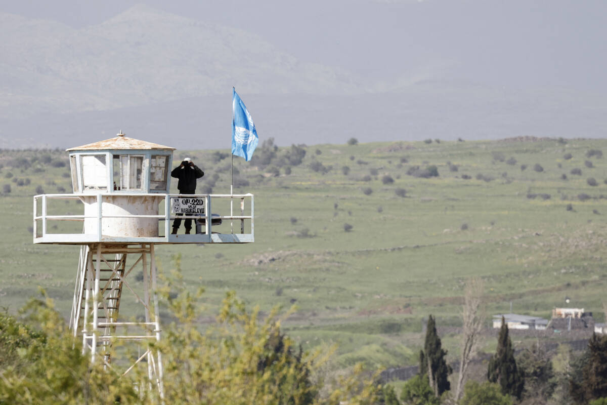 A United Nations peacekeepers observation point near the Quneitra border crossing with Syria in the Israeli-occupied Golan Heights. In recent months, Iran-backed groups have periodically fired shells from neighboring Syrian territory, 2/4/2024 (Jalaa Marey/AFP)