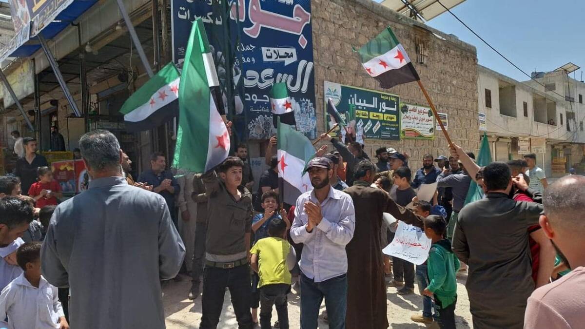 A protest in Hayat Tahrir al-Sham (HTS)-held northwestern Syria calling for the resignation of the group’s leader, Abu Muhammad al-Jolani, the release of detainees and other reforms, 17/5/2024 (Macro Media Center)