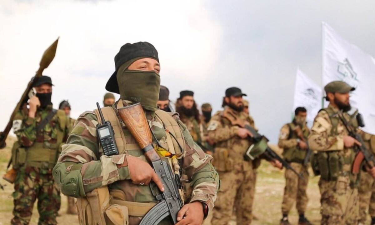 Hayat Tahrir al-Sham (HTS) fighters graduate from a military training course in Syria’s northwestern Idlib province, 21/3/2022 (Military Correspondent)