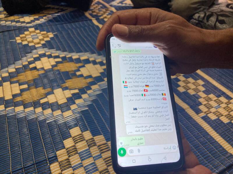 Abdulrahman Muhammad Ali, 41, shows a WhatsApp conversation with a smuggler advertising trips to Europe, 3/5/2024 (Hanna Davis/Syria Direct) 